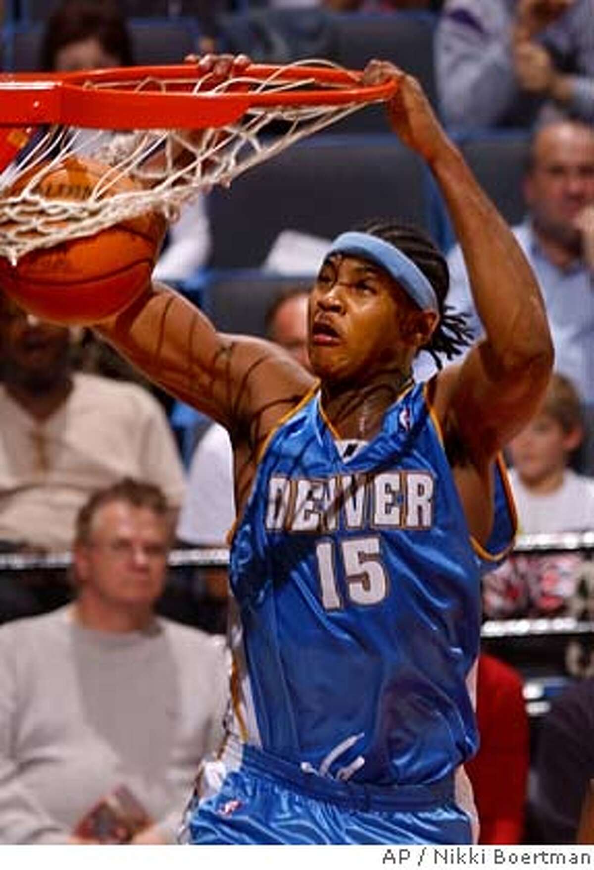 Denver Nuggets Carmelo Anthony dunks uncontested during the third quarter against the Memphis Grizzlies Sunday, Jan. 25, 2004 in Memphis, Tenn. Anthony led the scoring for the Nuggets with 25 points but the Grizzlies won, 106-88. (AP Photo/ Nikki Boertman) Clevelands LeBron James has made the jump from high school to the NBA, but not to the All-Star Game as a rookie. Clevelands LeBron James has made the jump from high school to the NBA, but not to the All-Star Game as a rookie. Ran on: 02-13-2005 Anthony brought Denver back to respectability in his rookie year, leading a playoff push.