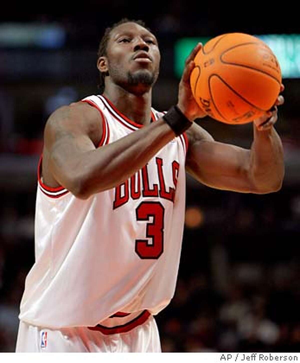 Chicago Bulls' Ben Wallace shoots a free throw during the second quarter of a pre-season NBA basketball game against the Washington Wizards, Wednesday, Oct. 11, 2006 in Chicago. (AP Photo/Jeff Roberson)