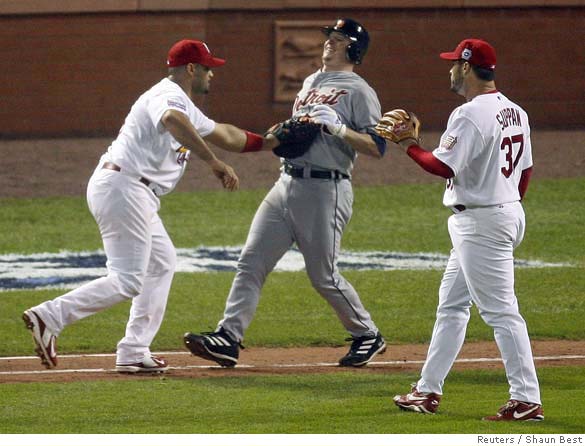 St. Louis Cardinals' So Taguchi watches his RBI-single in the