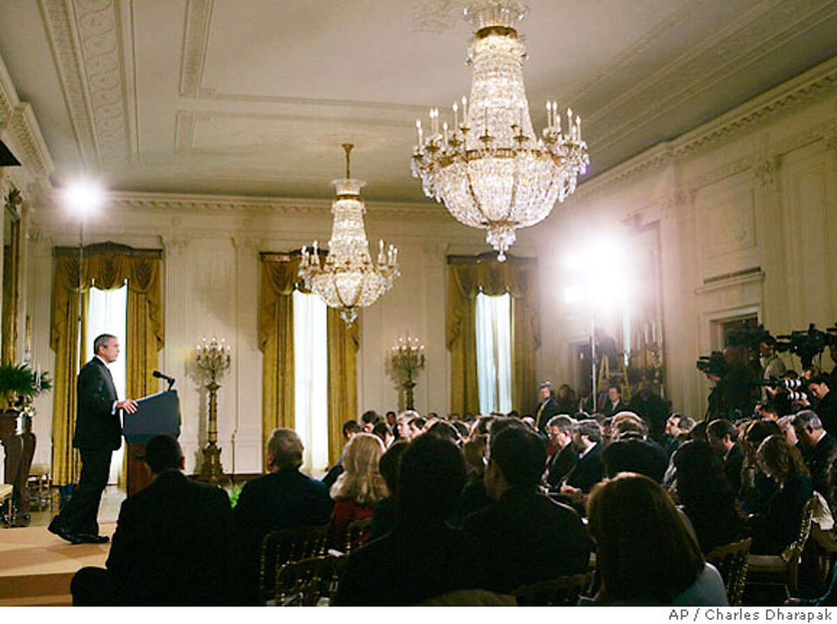 President Bush, left, speaks during a news conference in the East Room of the White House in Washington Wednesday, Oct. 25, 2006. Photo/Charles Dharapak)