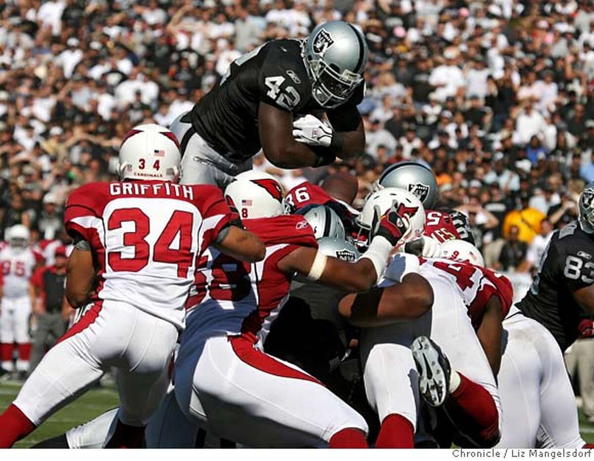 FILE ** Oakland Raiders fullback Zack Crockett (32) is tackled by