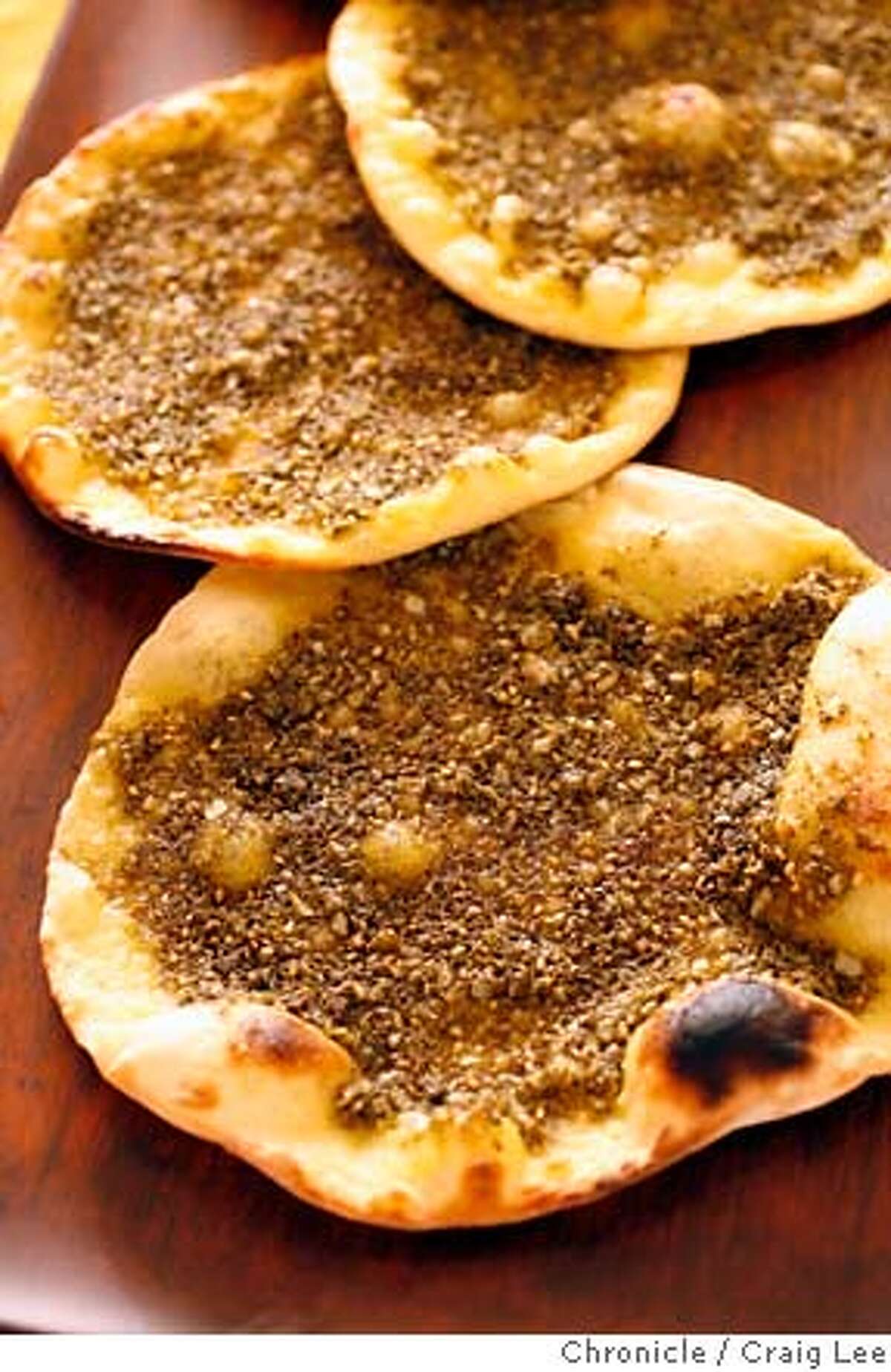 FLATBREAD20_153_cl.JPG Photo of Lebanese cookbook author, Anissa Helou, making some Mediterranean flatbreads. Photo of Tyme Bread. Craig Lee / The Chronicle MANDATORY CREDIT FOR PHOTOG AND SF CHRONICLE/ -MAGS OUT
