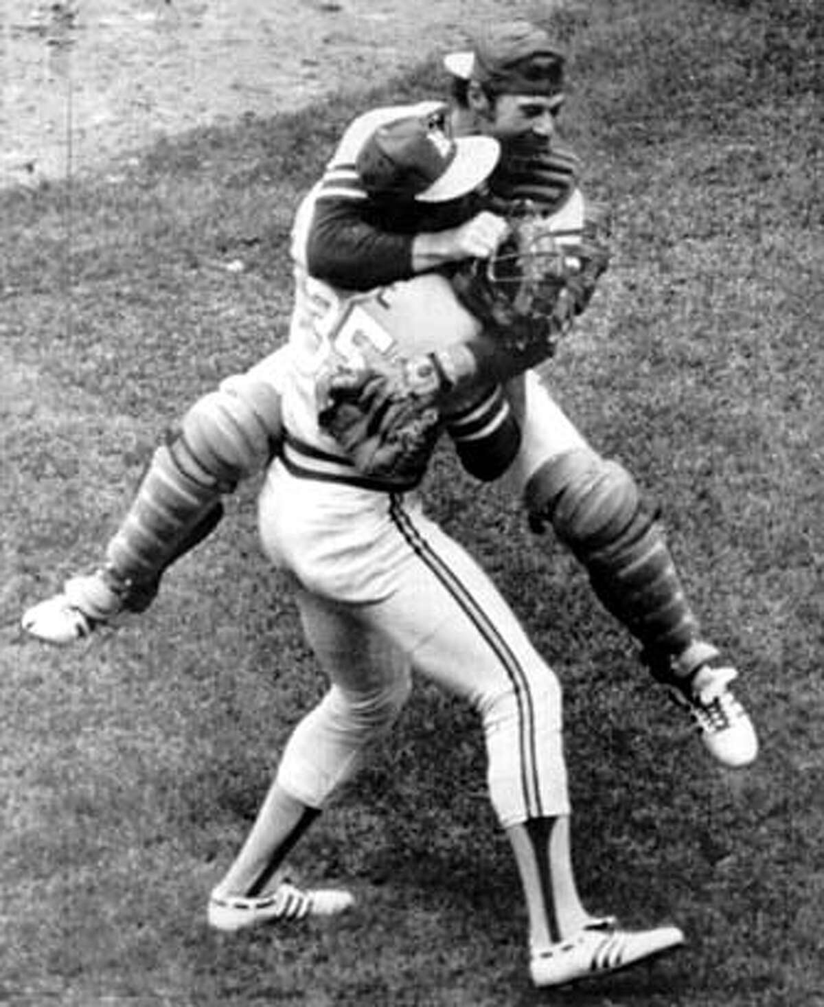 .jpg October 13, 1972 - A's catcher Gene Tenace leaps into the arms of pitcher Vida Blue in celebration after the A's clinched the American League Championship Series over the Detroit Tigers on Oct. 13, 1972 to advance to the World Series. PHOTO CREDIT: unknown
