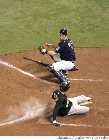 Minnesota Twins starting pitcher Brad Radke delivers a pitch in the first  inning of Game 3 in the American League Divisional Series baseball game  against the Oakland Athletics, Friday, Oct. 6, 2006