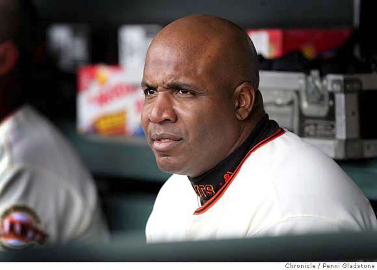 Barry Bonds watches the game from dugout San Francisco Giants vs Los Angeles Dodgers Event on 10/2/06 in San Francisco. Penni Gladstone / The Chronicle MANDATORY CREDIT FOR PHOTOG AND SF CHRONICLE/ -MAGS OUT