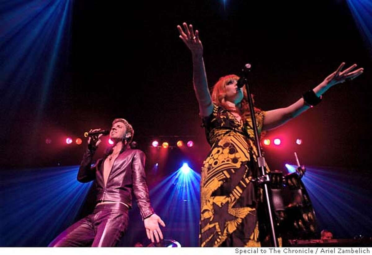 SCISSOR02_032_AZ.JPG Scissor Sisters singers Jake Shears and Ana Matronic rock out during their set at the Warfield on Friday night. Photo by ARIEL ZAMBELICH/Special to The San Francisco Chronicle Photo taken on 9/29/06, in SAN FRANCISCO, CALIFORNIA, USA **All names cq (source)