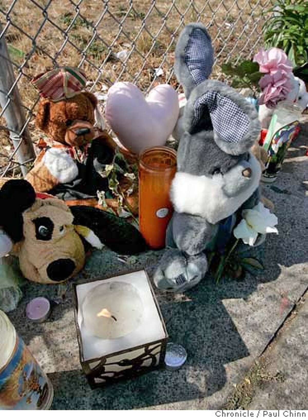 A memorial continues to grow for Gail Breda at 31st Street and Martin Luther King, Jr. Boulevard in Oakland, Calif. on Wednesday, Sept. 27, 2006. Breda and an acquaintance were shot and killed while riding their bicycles early Tuesday. PAUL CHINN/The Chronicle **Gail Breda MANDATORY CREDIT FOR PHOTOGRAPHER AND S.F. CHRONICLE/ - MAGS OUT