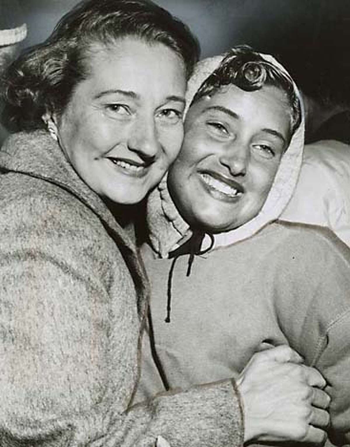 Myra Thompson, right, Farallon swim contest winner, with her mother, Elizabeth Thompson