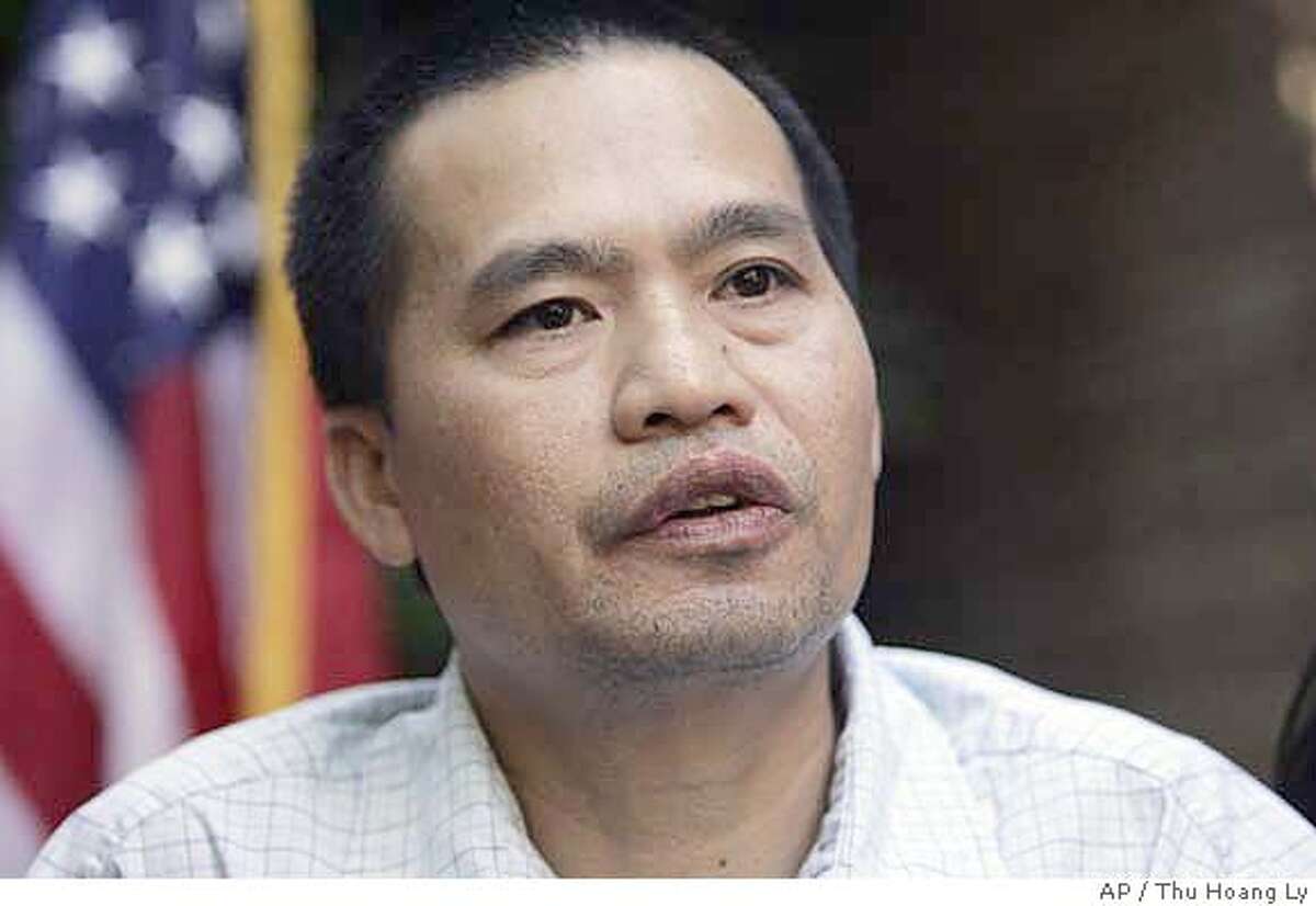 Cong Thanh Do speaks during a news conference at the office of U.S. Rep. Zoe Lofgren, D-Calif., in San Jose, Calif., Friday, Sept. 22, 2006. Cong Thanh Do, 47, an American pro-democracy activist, was jailed in Vietnam for more than a month on suspicion of plotting against the communist government returned home to a crowd of supporters. (AP Photo/Mercury News, Thu Hoang Ly) ** MAGS OUT, ** , NO MAGS, NO INTERNET