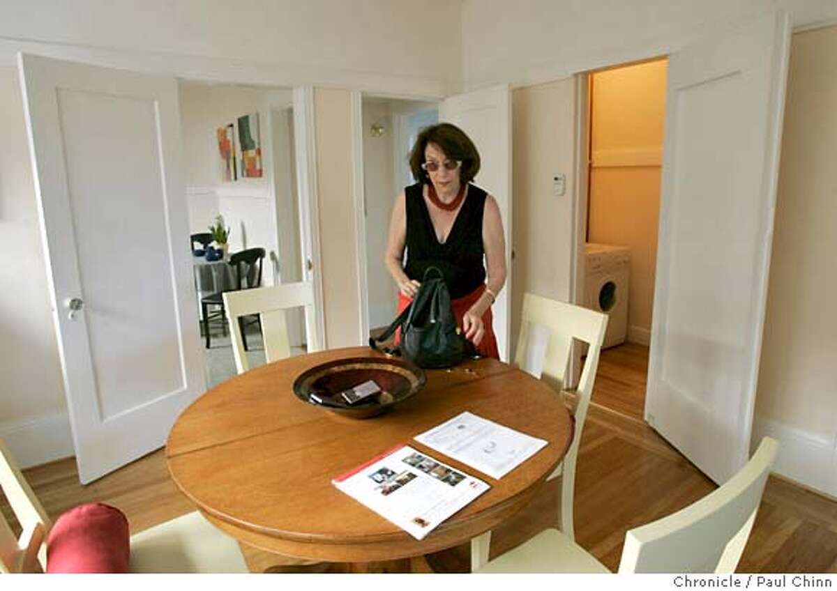 Realtor Barbara Hendrickson stands in the dining room of a Temescal neighborhood condo for sale in Oakland, Calif. on Wednesday, September 20, 2006 where the seller recently dropped the asking price. Monthly figures released this week are expected to show sales volumes diving and prices flattening. PAUL CHINN/The Chronicle **Barbara Hendrickson MANDATORY CREDIT FOR PHOTOGRAPHER AND S.F. CHRONICLE/ - MAGS OUT