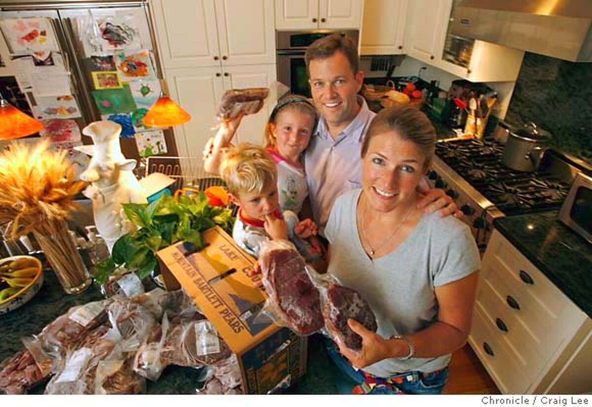 MEAT20_family_060_cl.JPG Food story about a trend toward more people buying meat directly from ranchers and farmers. Photo of the Hagan family, Jeff and his wife, Katie, with their two kids, Colin, 3, and Maddy, 5, in their kitchen with their frozen Morris Grassfed Beef the counter. Craig Lee / The Chronicle MANDATORY CREDIT FOR PHOTOG AND SF CHRONICLE/ -MAGS OUT