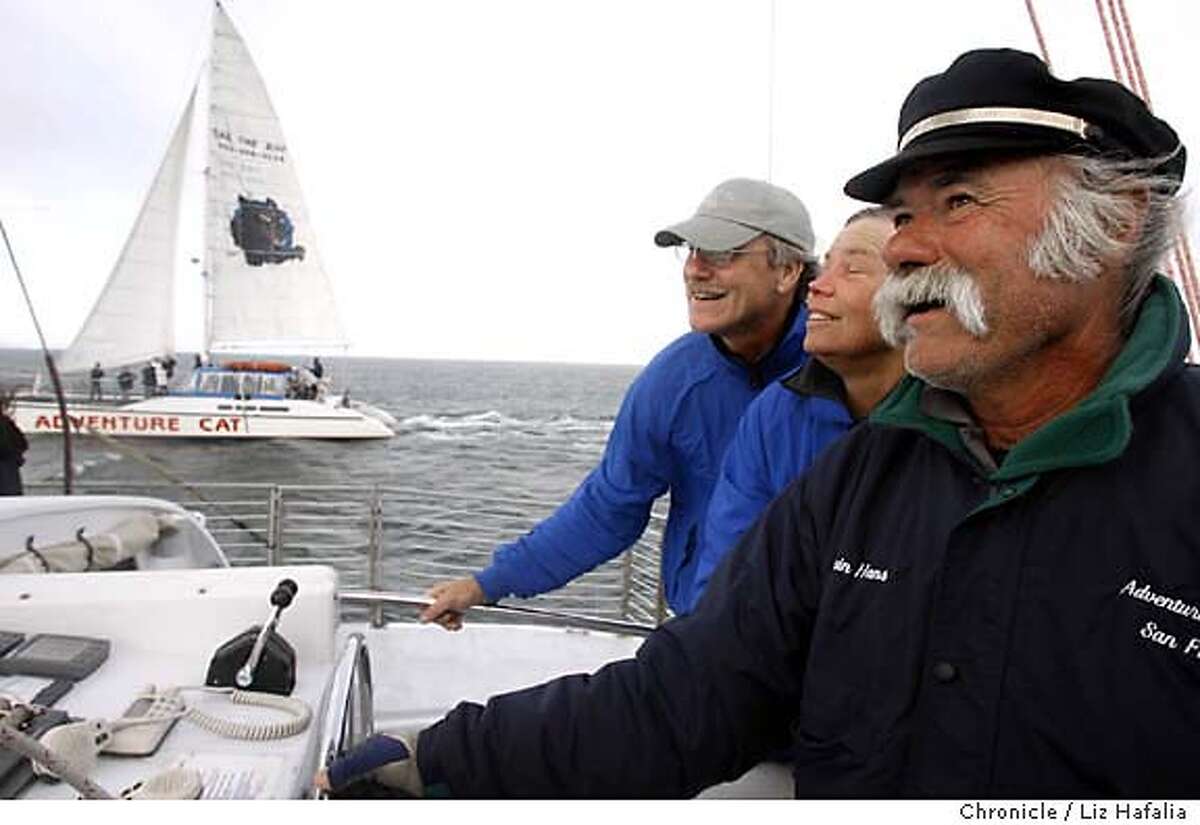 SAIL17_jpg.043.jpg Right to left--Hans Korfin, Pamela Simonson, and her husband Jay Gardner built the Adventure Cat (at top ,left), a catamaran at Pier 39, that takes people out on the SF bay for a sailing experience. Photographed by Liz Hafalia/The Chronicle MANDATORY CREEDCIT FOR PHOTOGRAPHER AND SAN FRANCISCO CHRONICLE/ -MAGS OUT