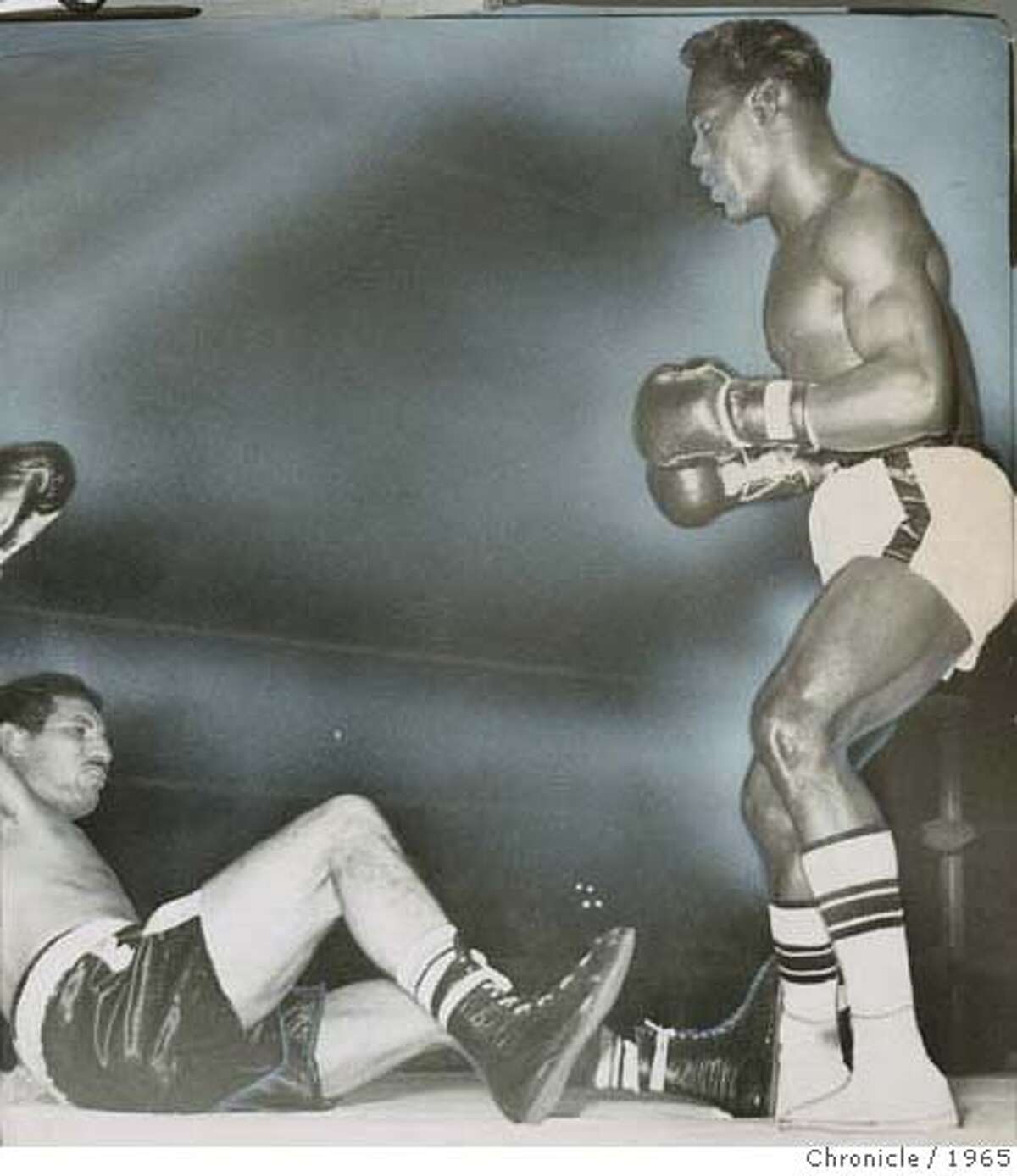 Jimmy Lester knocks down Florentino Fernandez at Kezar Pavillion, 10/20/1965 MANDATORY CREDIT FOR PHOTOG AND SF CHRONICLE/ -MAGS OUT