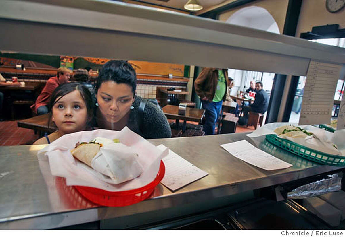 taqueria13_lataqueria_475_el.jpg Katya Stich,7, and her mom Alejandna , SF waiting for their order to come up. La Taqueria 2889 Mission St. They don't believe in using rice in their burritos. Eric Luse/The Chronicle Names (cq) from source MANDATORY CREDIT FOR PHOTOG /