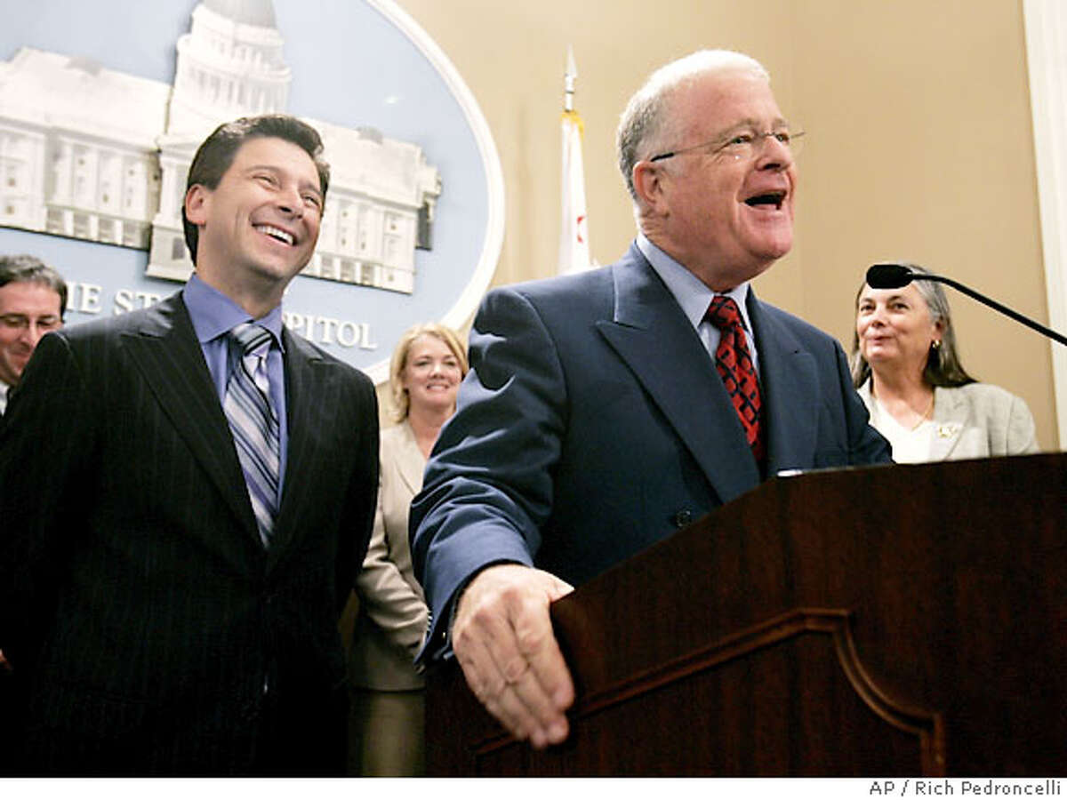 Assembly Speaker Fabian Nunez, D-Los Angeles, left, laughs at a comment made by state Senate President Pro Tem Don Perata, D-Oakland, center, during an announcement that they had reached an agreement with California Gov. Arnold Schwarzenegger on a global warming bill, during a Capitol news conference in Sacramento, Calif., Wednesday, Aug. 30, 2006. The measure, authored by Assemblywoman Fran Pavley, D-Agoura Hills, right, will make California the first state to impose a cap on all greenhouse gas emissions, including those from industrial plants.(AP Photo/ )
