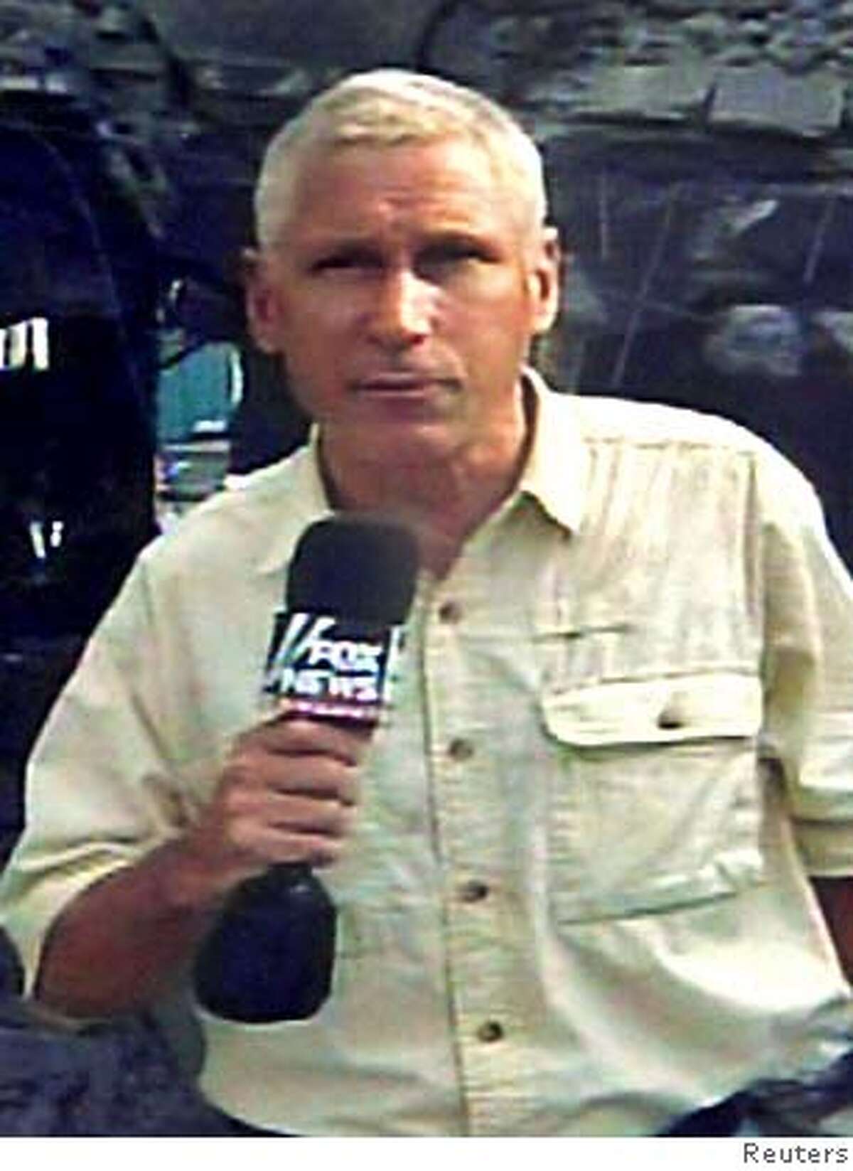 American Fox News Channel reporter Steve Centanni of the U.S., who was kidnapped by Palestinian gunmen on Monday in Gaza, is seen in this handout photo released August 16, 2006. Palestinian gunmen kidnapped two foreign journalists working for the Fox News Channel in Gaza on Monday, a witness and the U.S. television network said. NO ARCHIVES REUTERS/Handout (GAZA) 0