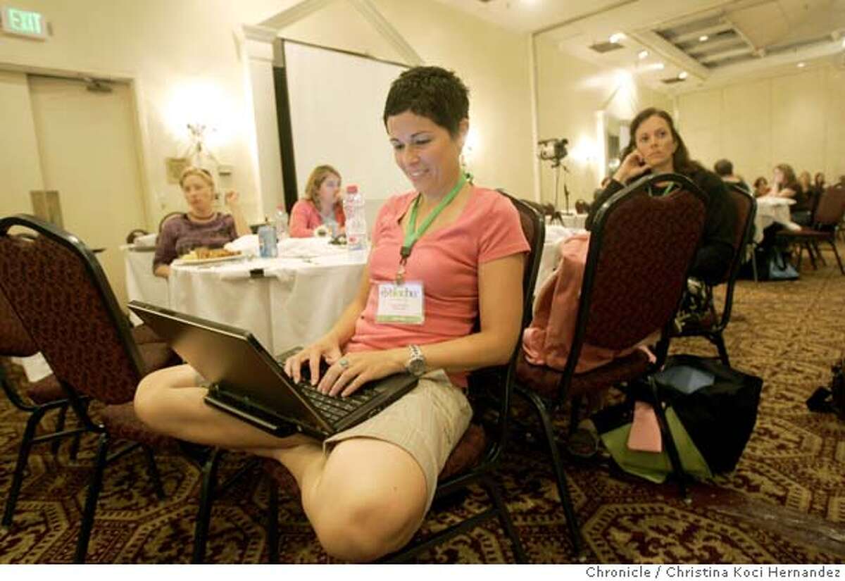 During the lunchtime BlogHer speakers presentation, Danielle Altshuler Wiley, surfs the internet on her laptop.At the BlogHer convention in San Jose, a gathering billed as a meeting place for female bloggers, advertisers are now present, from Weight Watchers to Saturn.(CHRISTINA KOCI HERNANDEZ/THE CHRONICLE) Mandatory Credit For Photographer and San Francisco Chronicle/No-Sales-Mags Out