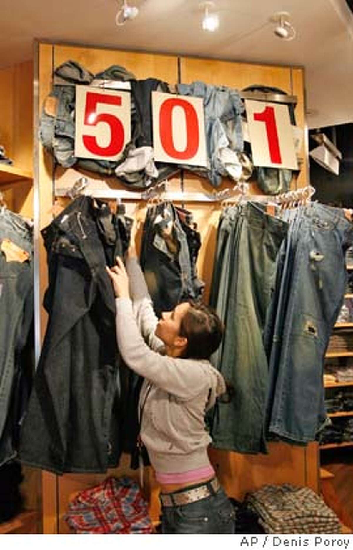 Levi's profit up 50%, but sales take a small hit / Tax benefit helps .  jeansmaker in 2nd quarter