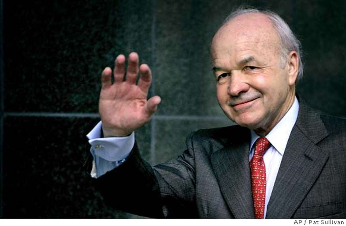 ** FILE ** Former Enron chairman Kenneth Lay waves as he walks to the federal courthouse in week ten of his fraud and conspiracy trial in this April 4, 2006 file photo in Houston. Lay, 64, has died Wednesday July 5, 2006, according to his lawyer. (AP Photo/Pat Sullivan, File)
