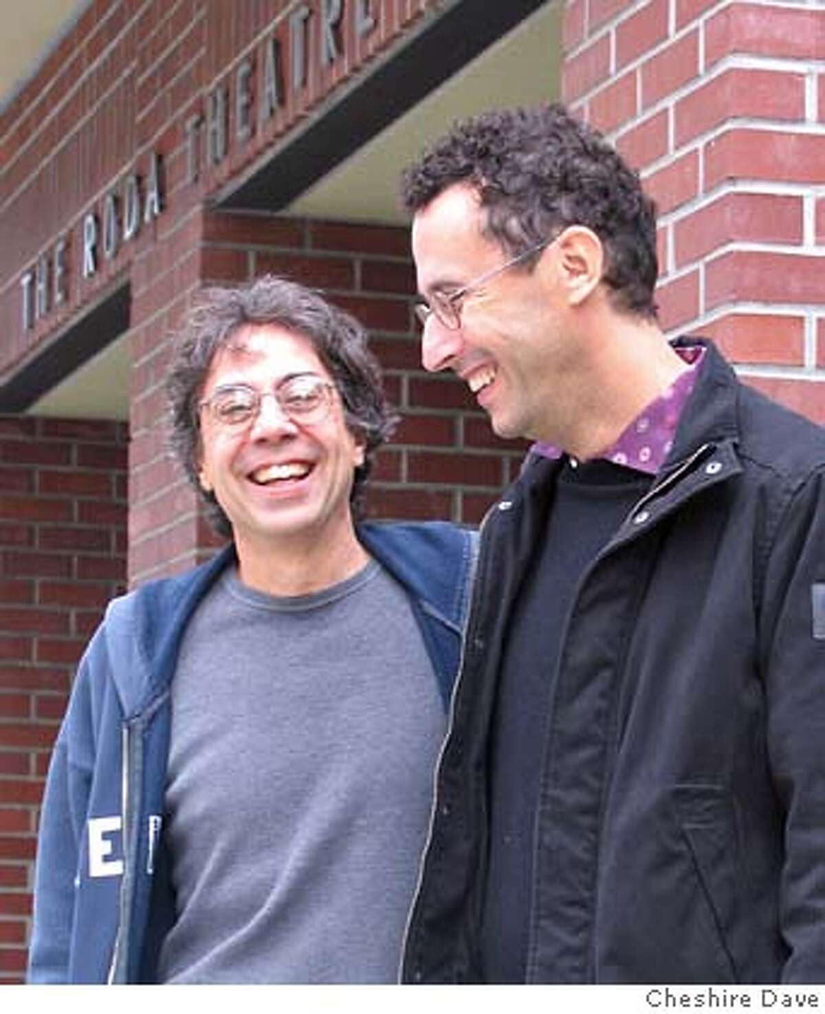 (l to r) Tony Taccone, artistic director of Berkeley Repertory Theatre, and playwright Tony Kushner in front of Berkeley Rep�s Roda Theatre where these long-time collaborators recently staged Brundibar. (Photographer: Cheshire Dave) SFC