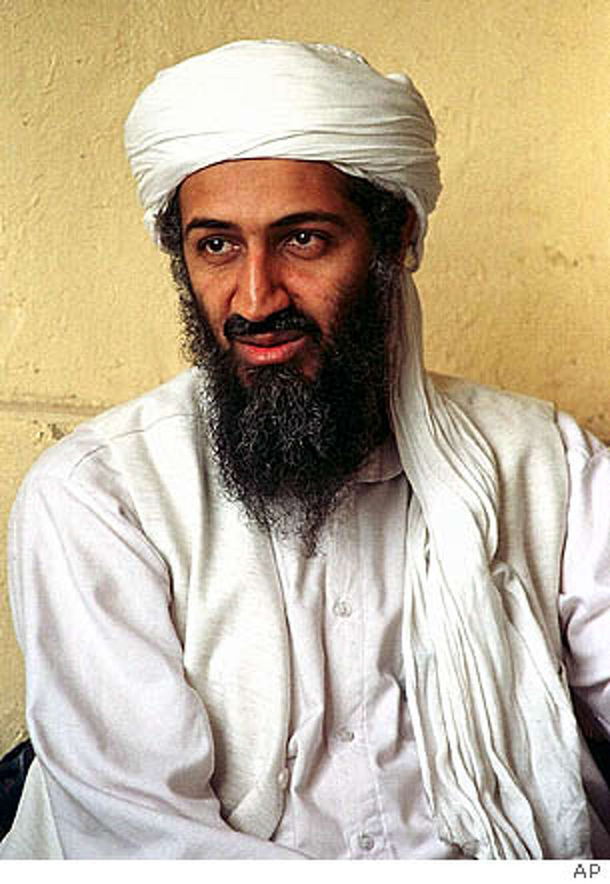 ** CAPTION CORRECTION, CORRECTS TITLE TO AL-QAIDA LEADER, NOT EXILED SAUDI DISSIDENT ** FILE ** Al-Qaida leader Osama bin Laden is seen in this April 1998 file photo in Afghanistan. Al-Jazeera aired an audiotape purportedly from Osama bin Laden on Thursday, Jan. 19, 2006, saying al-Qaida is making preparations for attacks in the United States but offering a truce to rebuild Iraq and Afghanistan. (AP Photo) Ran on: 01-20-2006 Ran on: 01-20-2006 Ran on: 01-20-2006 APRIL 1998 FILE PHOTO