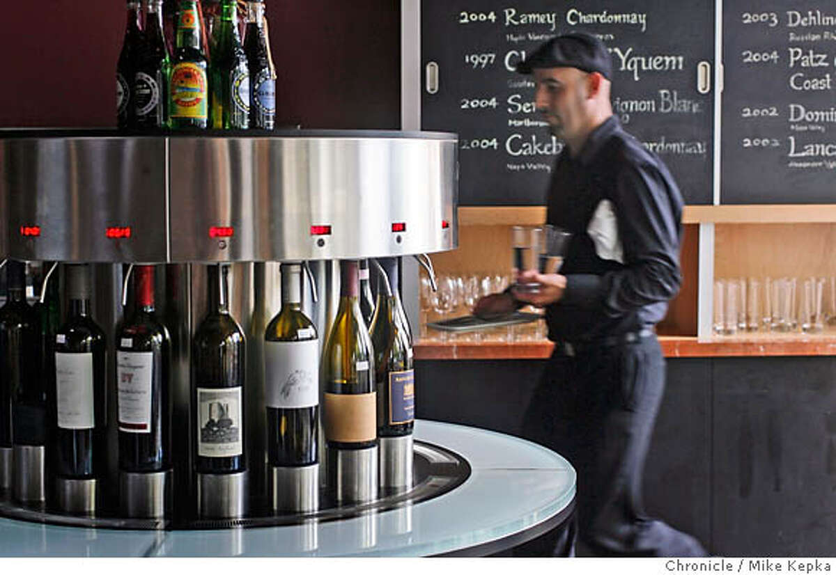 dining21029_mk.JPG This is the automatic red wine tasting machine at Taste. Taste is a new wine bar, wine shop, and lunch/dinner spot in Bekeley, CA. Mike Kepka / THe Chronicle MANDATORY CREDIT FOR PHOTOG AND SF CHRONICLE/ -MAGS OUT