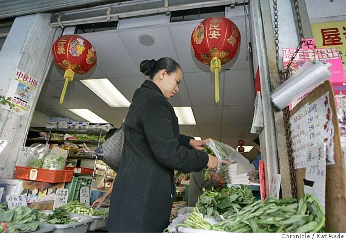 OAKMAYOR01_0005_KW_.jpg Undecided in the Mayoral race, Sorika Sao, 41, a Cambodian-American shops for fresh vegetables at Yuen Hop Noodle Company and Asian Food Products in Oakland's Chinatown for her restaurant Battambang Wednesday May 31, 2006 when Chronicle reporter Chris Heredia with the help of a translator went to speak to voter's in Oakland's Chinatown to determine whether or not voter's in Oakland are voting along ethnic lines. (Kat Wade/The Chronicle) ** Sorika Sao (self) cq Ran on: 06-04-2006 For Dellums: Carol and Bill Leimbach both support the former U.S. representative for mayor.