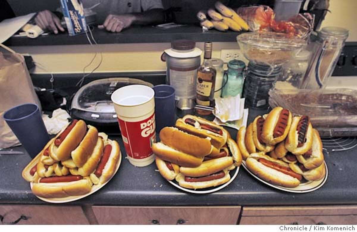 This is the scene on May 24 just before Joey Chestnut of San Jose downs 40 hot dogs in his San Jose apartment's kitchen. He is training for the July 4 Nathan's hot dog eating competition in New York. Kim Komenich / The Chronicle **Joey Chestnut MANDATORY CREDIT FOR PHOTOG AND SAN FRANCISCO CHRONICLE/ -MAGS OUT
