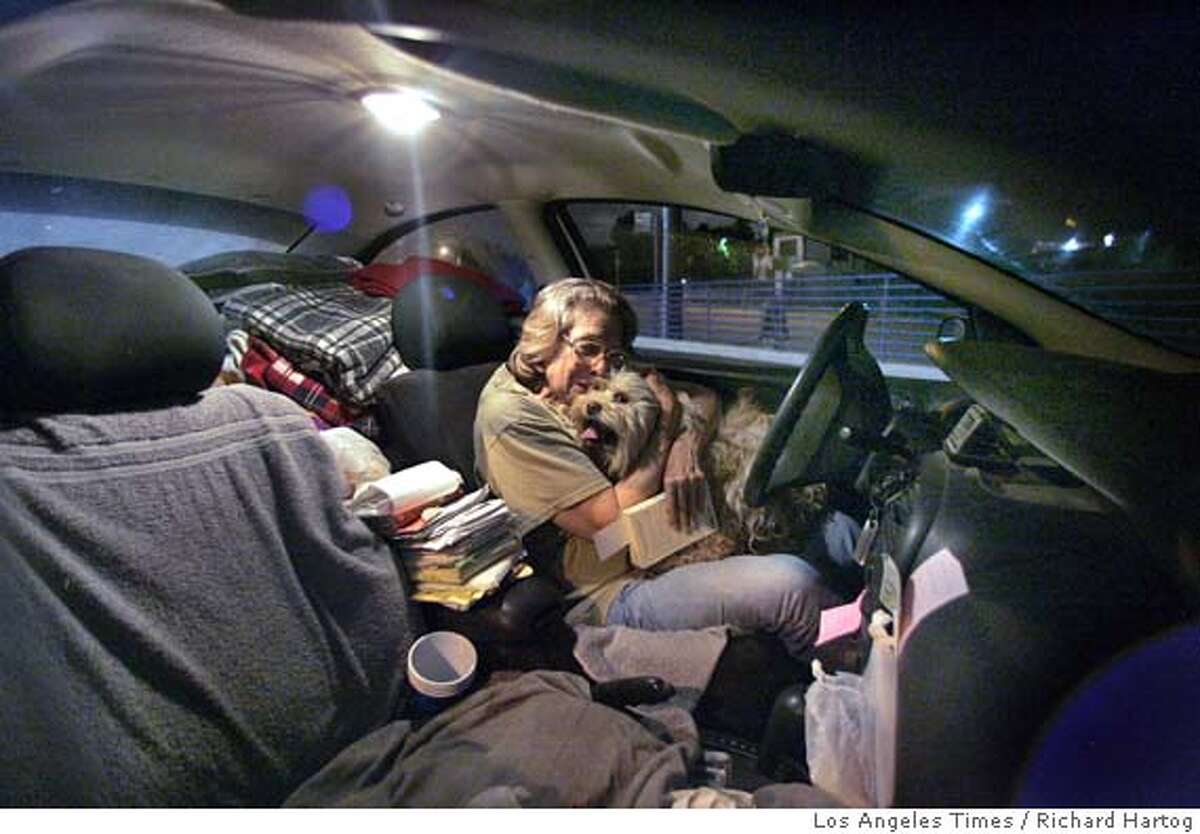 Woman homeless but driven / 71-year-old lives in her car with her dog after hitting bumps in