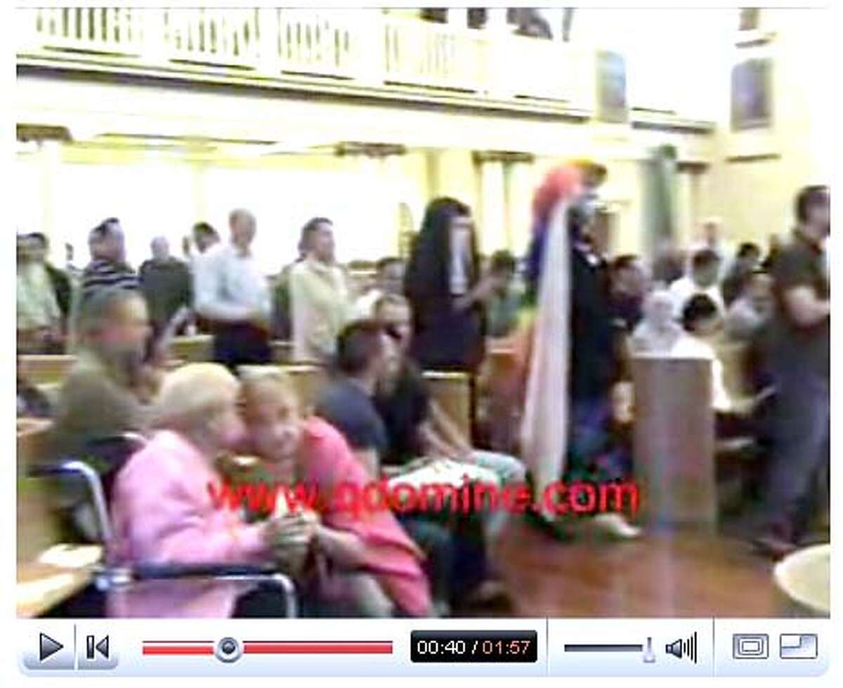 archbishop17_ph7.JPG Screen grab from a youtube video showing members of the Sisters of Perpetual Indulgence attending communion at the Most Holy Redeemer Church in the Castro. The sisters were given communion by Catholic Archbishop George Niederauer which has caused a stir amongst Catholics and conservative talk show host Bill Reilly. www.youtube.com / Courtesy to The Chronicle MANDATORY CREDIT FOR PHOTOG AND SAN FRANCISCO CHRONICLE/NO SALES-MAGS OUT