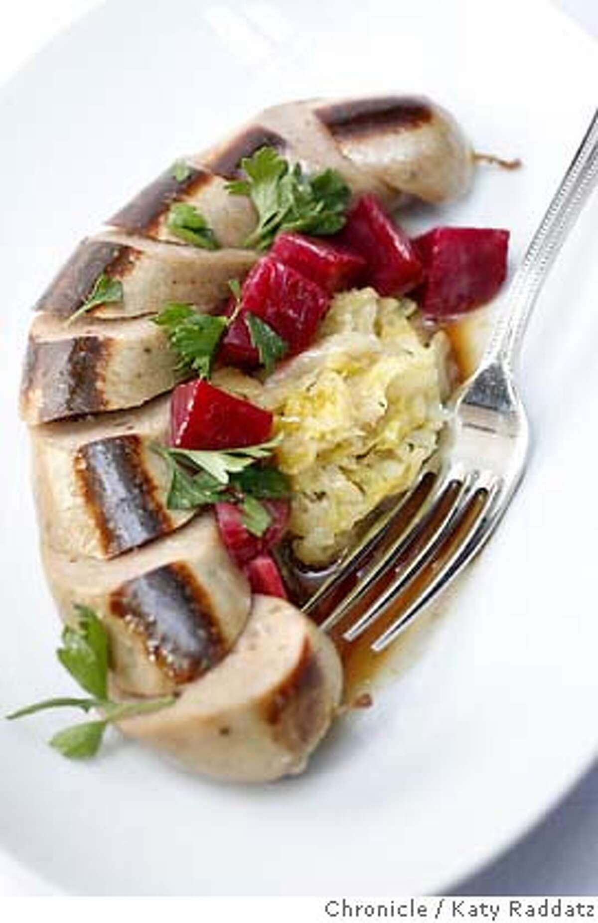 d.14SPRUCE_035_RAD.jpg SHOWN: Boudin Blanc with house made sauerkraut and beets from the restaurant's farm. Spruce is an important restaurant that has just opened in San Francisco at 3640 Sacramento St. (Katy Raddatz/The Chronicle) **