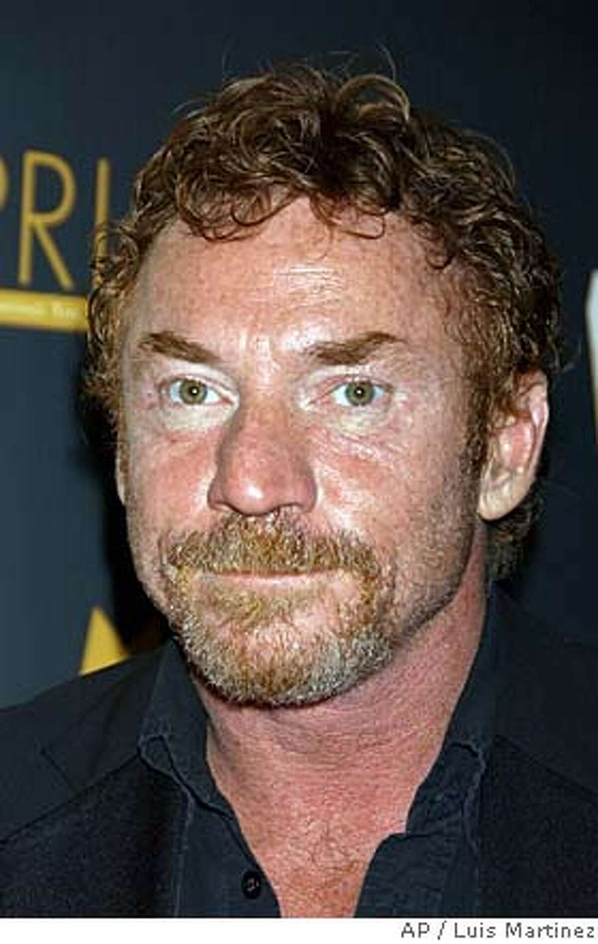 ** FILE ** Danny Bonaduce arrives at the 10th Annual PRISM Awards held at the Beverly Hills Hotel in this April 27, 2006 file photo in Beverly Hills, Calif. Former "Survivor" contestant Jonny Fairplay filed a police report Wednesday, Oct. 3, 2007 alleging that radio talk show host Danny Bonaduce threw him and knocked out his teeth during an awards show. (AP Photo / Luis Martinez) APRIL 27, 2006 FILE PHOTO