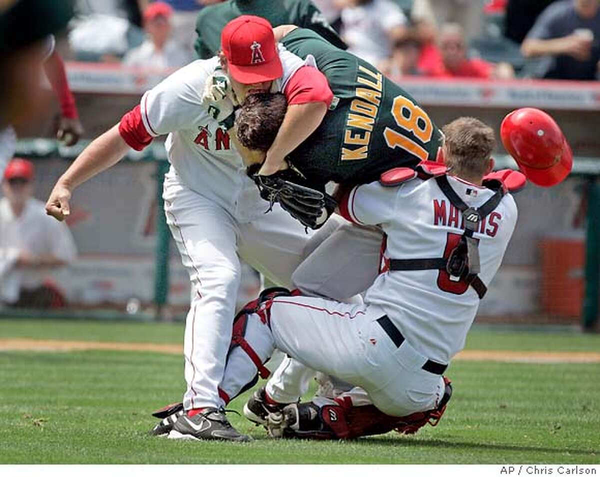 A's win, play brawl game / Kendall miffed at L.A.'s Lackey