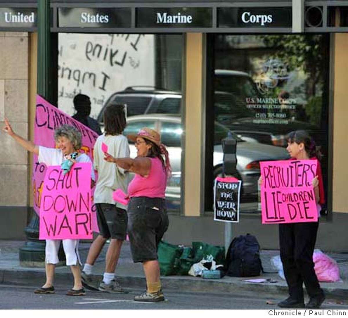 Demonstrators from Code Pink protest in front of a Marine Corps recruiting office in Berkeley, Calif. on Wednesday, Oct. 3, 2007. PAUL CHINN/The Chronicle