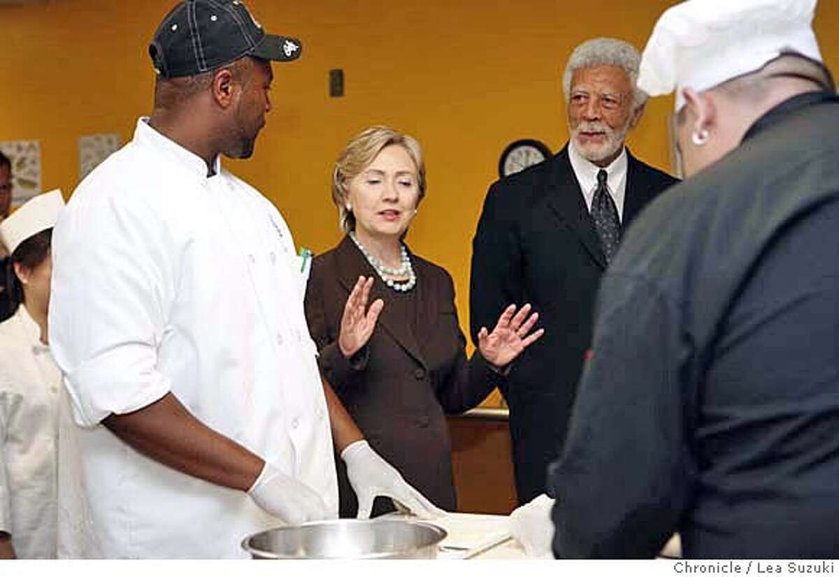 Hillary Clinton talks to Correy Williams (at left) as she tours a culinary fundamentals 1 and 2 class with Ron Dellums at Laney College. Hillary Clinton tours a culinary class and is endorsed by Mayor Ron Dellums at Laney College during an appearance at the Student Center. Lea Suzuki / The Chronicle Photo taken on 10/1/07, in Oakland, CA, USA