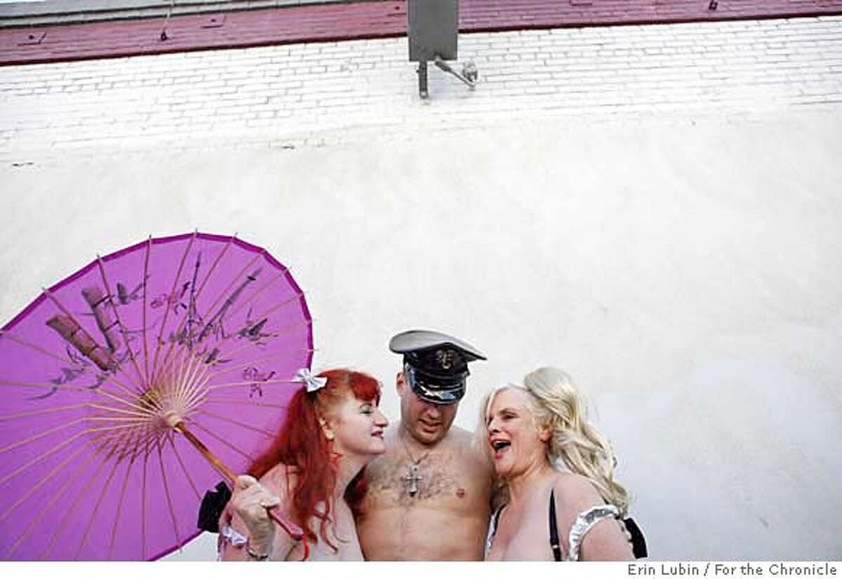 FOLSOMSTFAIR_003_EAL.JPG Andrea Storm, left, of San Jose, Jeff Dee, middle, of Monterey, and Zoe Zane, right, of Campbell, attend the Folsom Street Fair in San Francisco, CA Sunday, September 30, 2007. Event on 9/30/07 in San Francisco. Erin Lubin / For the Chronicle