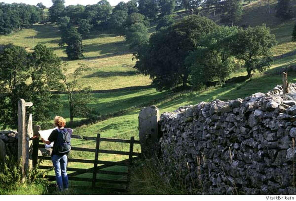 TRAVEL FICTIONAL -- The rolling, sheep-dotted hills around Askrigg in England's Wensleydale were the setting for both the book and television show, "All Creatures Great and Small." Credit: VisitBritain