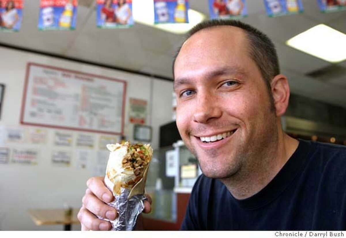 acetime04_02_06_0004_db.JPG Charles Hodgkins enjoys his pork burrito at Taqueria San Francisco at York and 24th Streets. Event on 2/25/06 in San Francisco. Darryl Bush / The Chronicle MANDATORY CREDIT FOR PHOTOG AND SF CHRONICLE/ -MAGS
