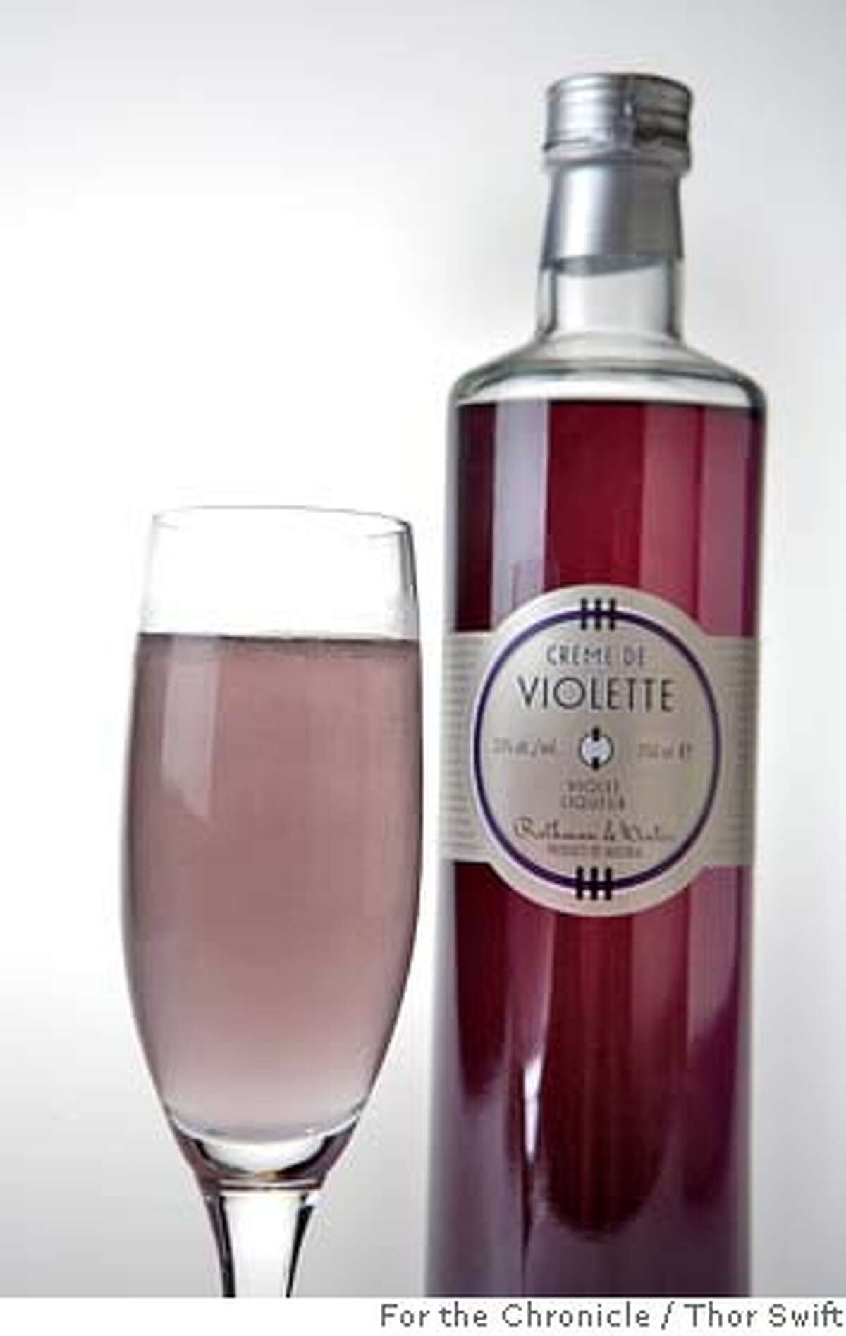The Moonlight Coctail and bottle of Creme de Violette. Photograph taken Thursday, Sept. 13, 2007 at the San Francisco Chronicle studio. Thor Swift For The San Francisco Chronicle Ran on: 09-28-2007