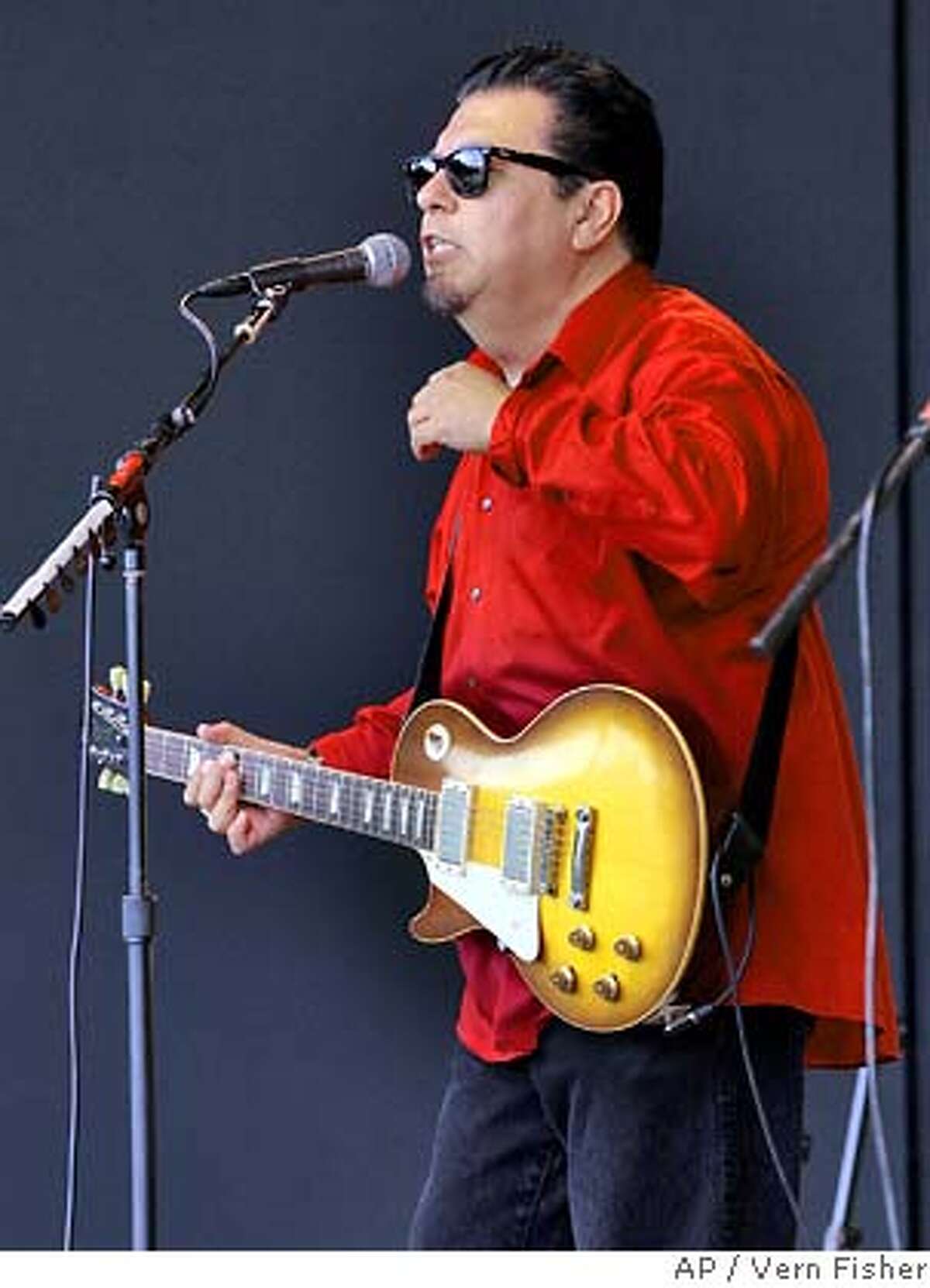 Cesar Rosas of Los Lobos performs Saturday, Sept. 22, 2007, during the 50th annual Monterey Jazz Festival in Monterey, Calif. (AP Photo/Monterey County Herald, Vern Fisher)