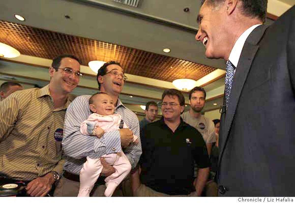 ROMNEY_153.JPG Former Massachuetts Gov. Mitt Romney (far right), the GOP presidential candidate, is doing an "Ask Mitt Anything" town hall meeting in Santa Clara next to David's restaurant where he greets supporters Glen Gechlik (left), and his twin brother Gary Gechlik (right), and Gary's 4 month old daughter, Sarah Gechlik. Liz Hafalia/The Chronicle/Santa Clara/9/25/07 **Mitt Romney, Glen Gechlik, Gary Gechlik, Sarah Gechlik. cq �2007, San Francisco Chronicle/ Liz Hafalia MANDATORY CREDIT FOR PHOTOG AND SAN FRANCISCO CHRONICLE. NO SALES- MAGS OUT.