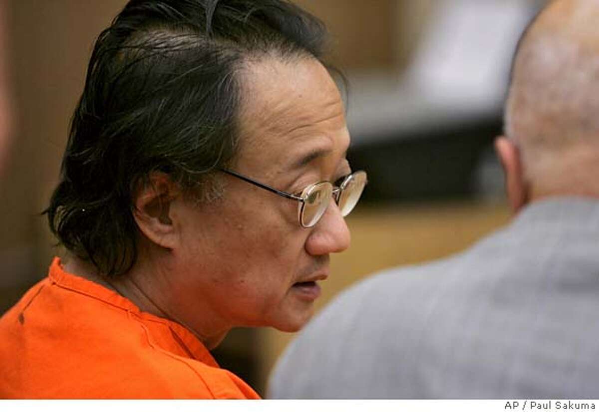 Norman Hsu, 56, left, talks with his attorney James Brosnahan, right, in a Redwood City, Calif., courtroom, Friday, Sept. 21, 2007. Democratic fundraiser Norman Hsu was ordered held without bail Friday, a day after being returned from Colorado on an outstanding warrant for his arrest in a grand theft case. (AP Photo/Paul Sakuma, pool) POOL PHOTO