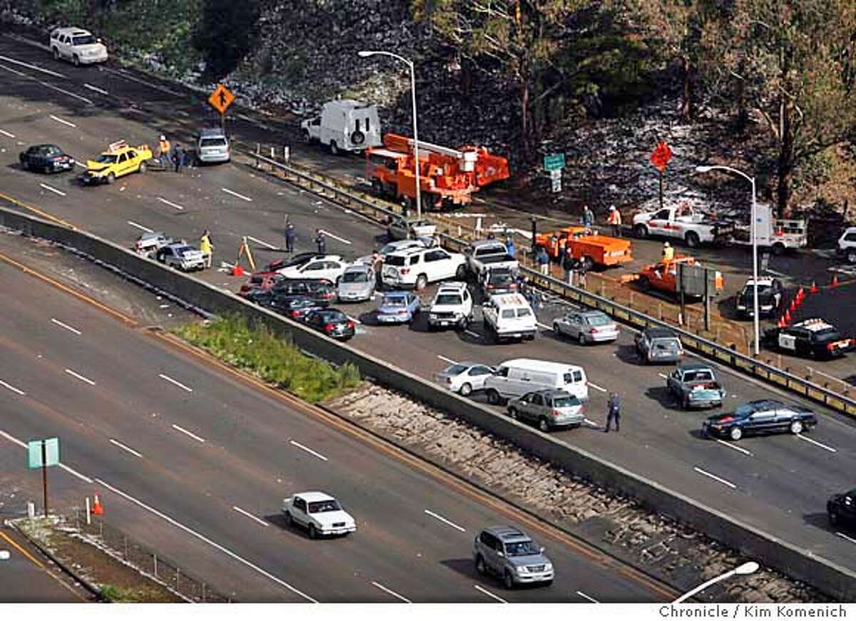 Northbound lanes of highway 101 traffic remained closed into the afternoon. Traffic was diverted onto downtown Sausalito streets after a 28-car pile-up on the Waldo Grade in Sausalito, Calif. on 3/11/06. Two passengers in one of the vehicles died in the accident which occurred at around 2:30 a.m. KIM KOMENICH/The Chronicle