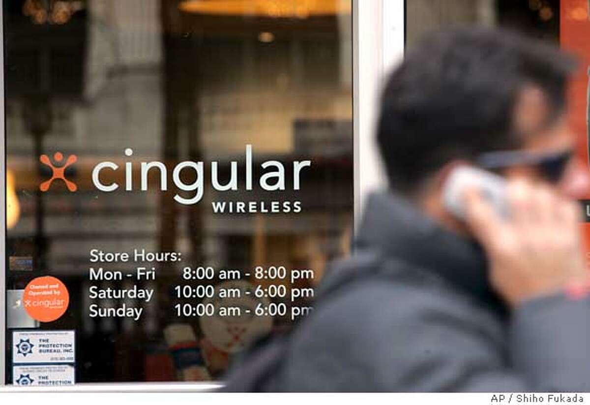A man walks by a Cingular store Monday, March 6, 2006 in New York. Cingular Wireless LLC, a joint venture of AT&T and BellSouth, is the nation's largest cell phone provider. AT&T has offered $67 billion to acquire BellSouth. (AP Photo/Shiho Fukada)