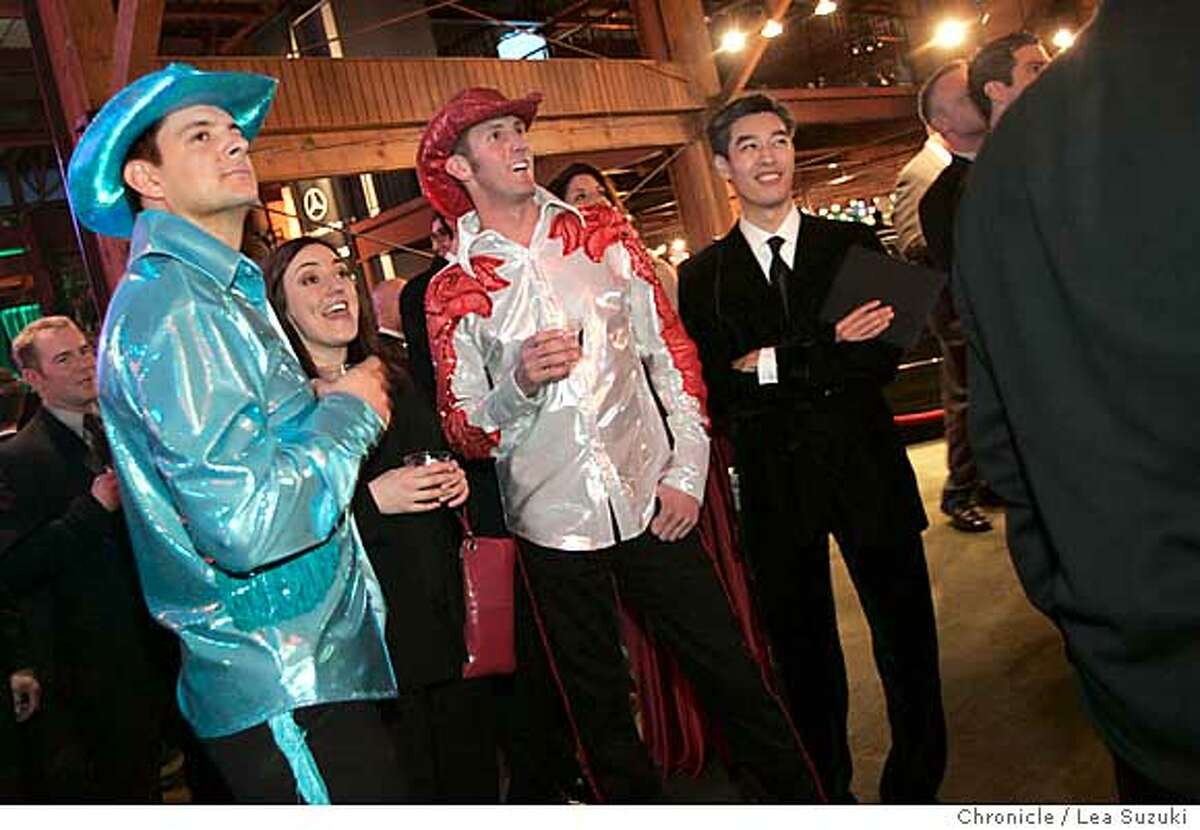 academyparty_053_ls.JPG from left: Brian Lammers of SF, Stephanie Infantino of SF, Jason Dorn of SF and Hao Le of Mountain View react to the winner of Best Supporting Actress category at the Academy of Friends party at Concourse Exhibition Center. Academy of Friends Party. Bunch of people together to watch Academy Awards at Concourse Exhibition Center. Goes on for a while. It's a big deal this year because of Brokeback Mountain. Lots of gay men there very excited about the nomination. Men painted golden serving drinks. LEA--Need photo by 9:30pm. Editor will presume photo is horizontal. Photo taken on 3/5/06 in San Francisco, CA. Photo by Lea Suzuki/ The San Francisco ChronicleRan on: 03-06-2006 From left: Brian Lammers, Stephanie Infantino and Jason Dorn, all of San Francisco, and Hao Le of Mountain View at the Oscar party at the Concourse Exhibition Center.Ran on: 03-06-2006 From left: Brian Lammers, Stephanie Infantino and Jason Dorn, all of San Francisco, and Hao Le of Mountain View attend the Oscar party at the Concourse Exhibition Center.
