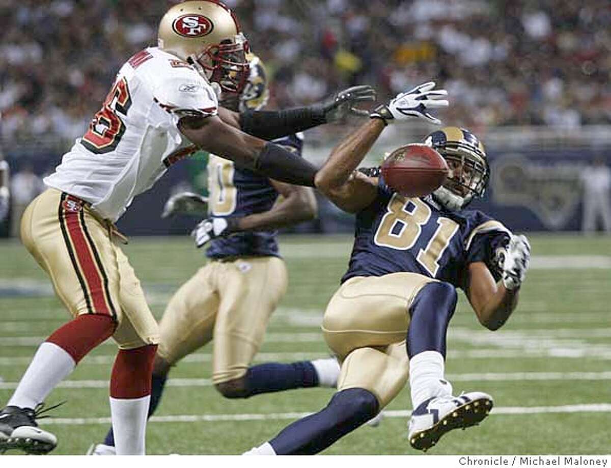 San Francisco 49ers Mark Roman (#26) breaks up a pass intended for St Louis Rams Torry Holt (#81) in the 1st quarter. The St Louis Rams host the San Francisco 49ers at Edward Jones Dome on 9/16/07 in St Louis, MO. The SF 49ers won 17-16. Photo by Michael Maloney / San Francisco Chronicle ***roster/code replacement MANDATORY CREDIT FOR PHOTOG AND SF CHRONICLE/NO SALES-MAGS OUT