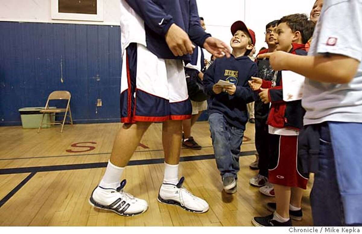 Fresno's tall order / 7-foot Lopez twins on way to Stanford