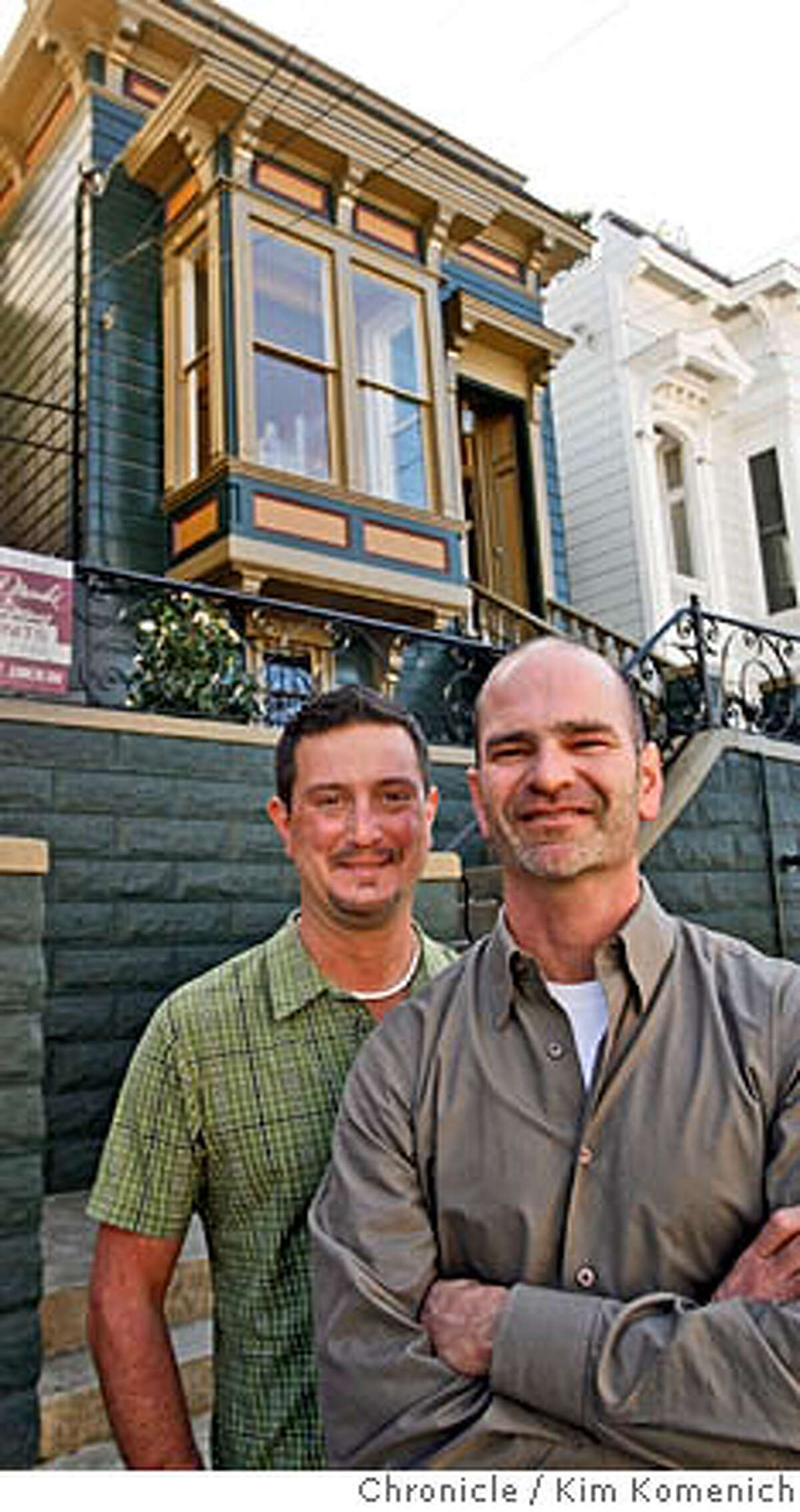 DUPLEX26_0049_KK.JPG L to R Brian Lackey, Malcolm Davis in front of the 19th Street duplex they own. Architect Malcolm Davis and his partner Brian Lackey own a duplex in the Castro. Originally, the house was being sold as a tear-down, even with plans for a new 3,500 square foot house, included. Davis decided to go a different way, preserving the existing building. What we now have is two one-bedroom units, only about 700 square feet each, but they feel a whole lot bigger because of creative use of space and light. San Francisco Chronicle photo by Kim Komenich 2/21/06 � Copyright 2006 Kim Komenich/San Francisco Chronicle