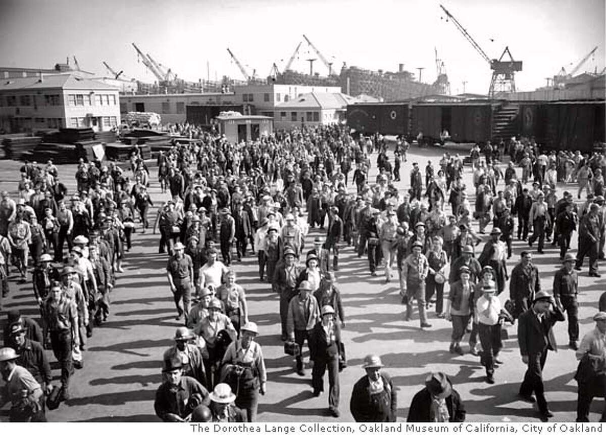 ONE-TIME PRINT AND ONLINE USE ONLY. SHIFT CHANGE 3:30 PM - COMING ON OF YARD 3 - KAISER SHIPYARDS. CIRCA 1942 EXACT AND NOT TO BE EDITED MANDATORY PHOTO CREDIT FOR ONE-TIME PRINT AND ONLINE USE: � The Dorothea Lange Collection, Oakland Museum of California, City of Oakland ONE-TIME PRINT AND ONLINE USE ONLY. ONE-TIME PRINT AND ONLINE USE ONLY.
