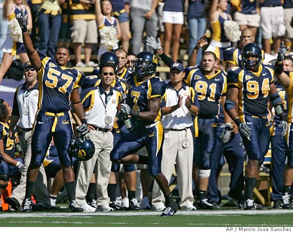 California running back Justin Forsett, top, is lifted in the air by  teammate Noris Malele after scoring on a 39-yard run against Louisiana Tech  in the first half of a college football